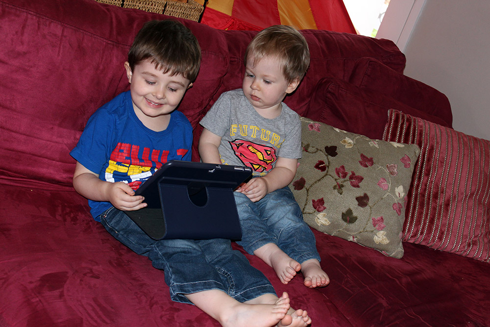 Addi and Pressie Checking Out His New Tablet
